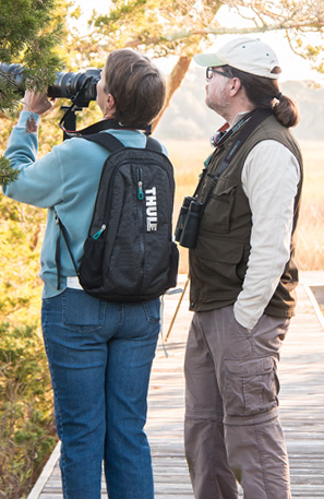 Kim made an image of me advising Robin about photographing small birds. Robin is a very fast learner and made several great wildlife images during the workshop.